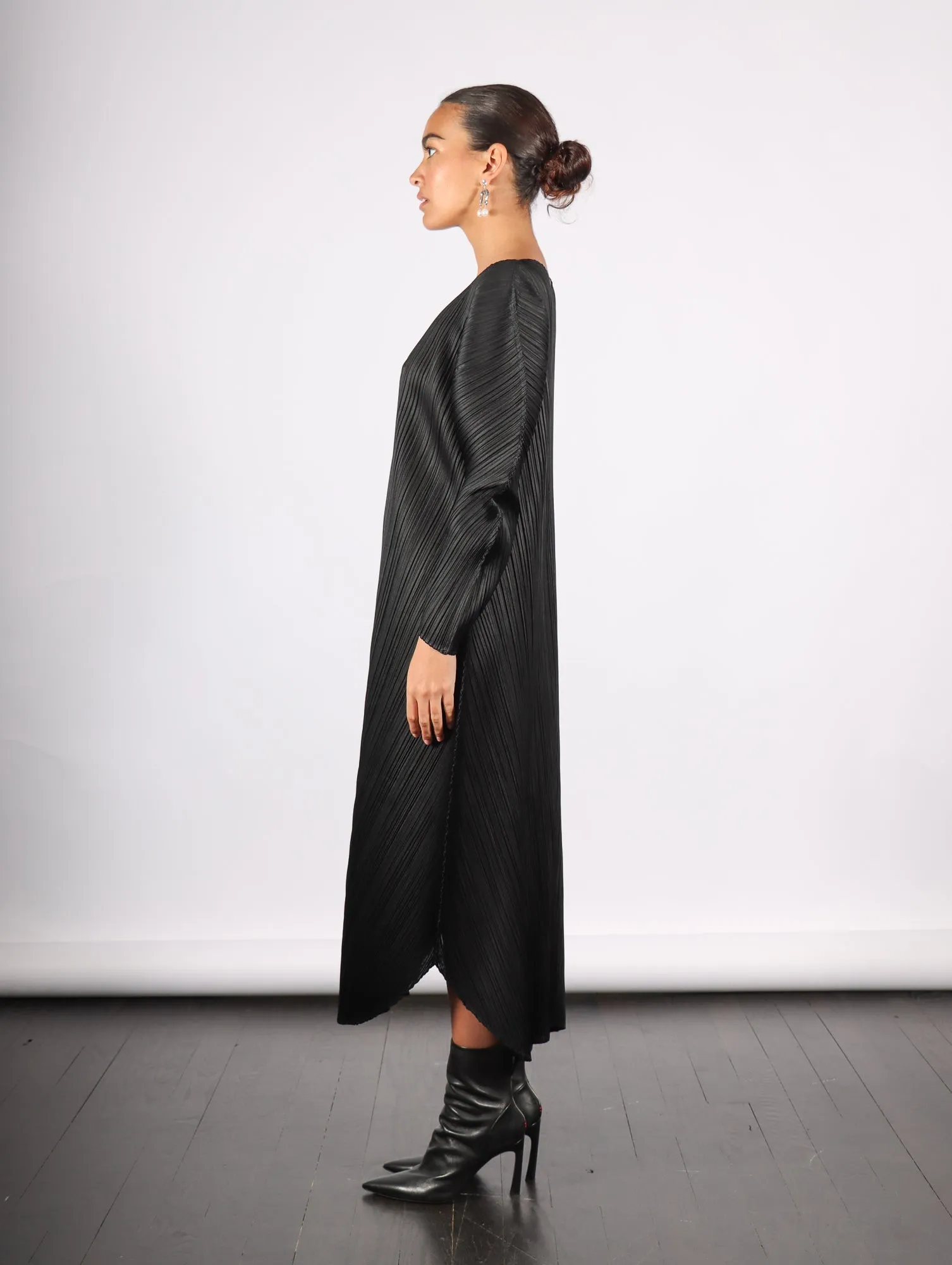 Wormhole Dress in Black by Pleats Please Issey Miyake